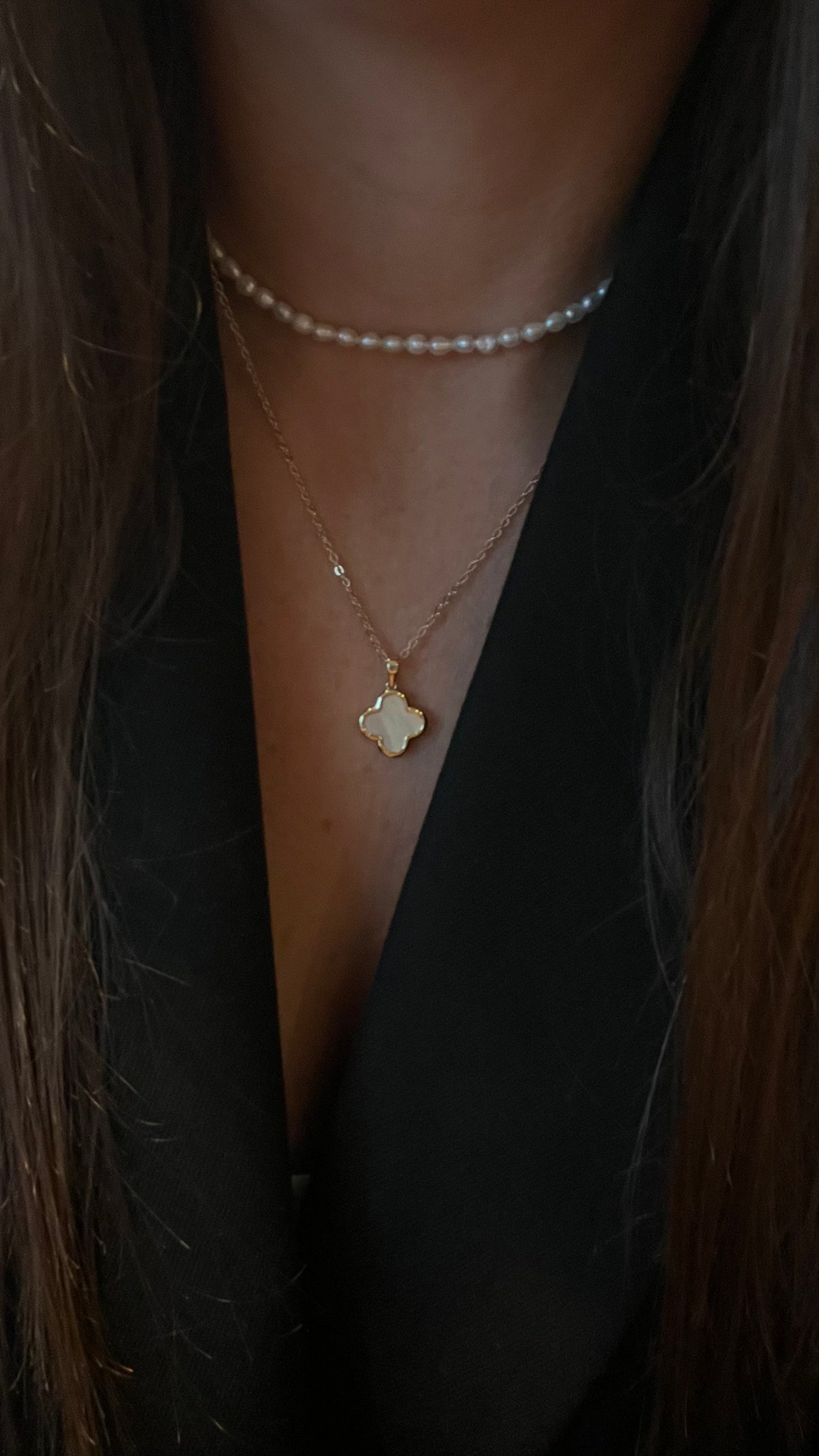 Necklace made of thin chain and mother of pearl clover pendant. Gift for her
