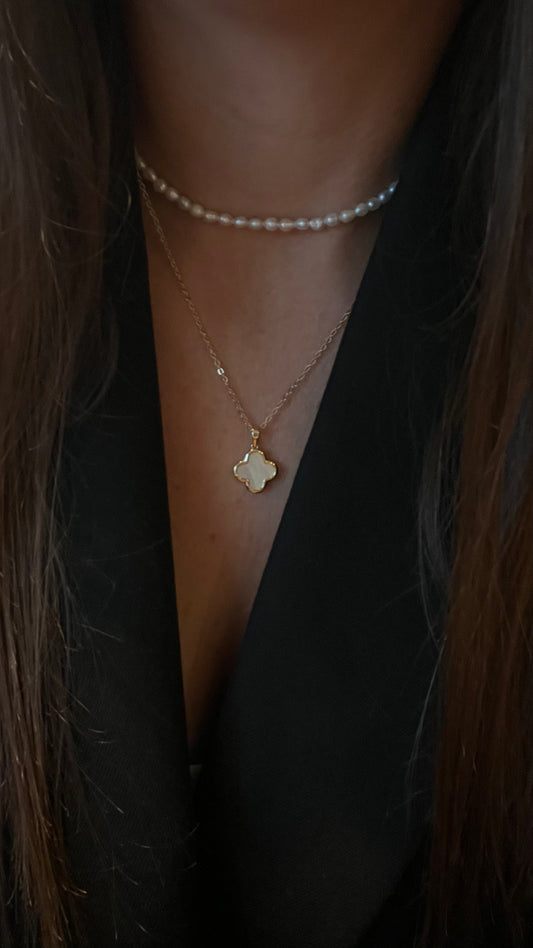 Necklace made of thin chain and mother of pearl clover pendant. Gift for her